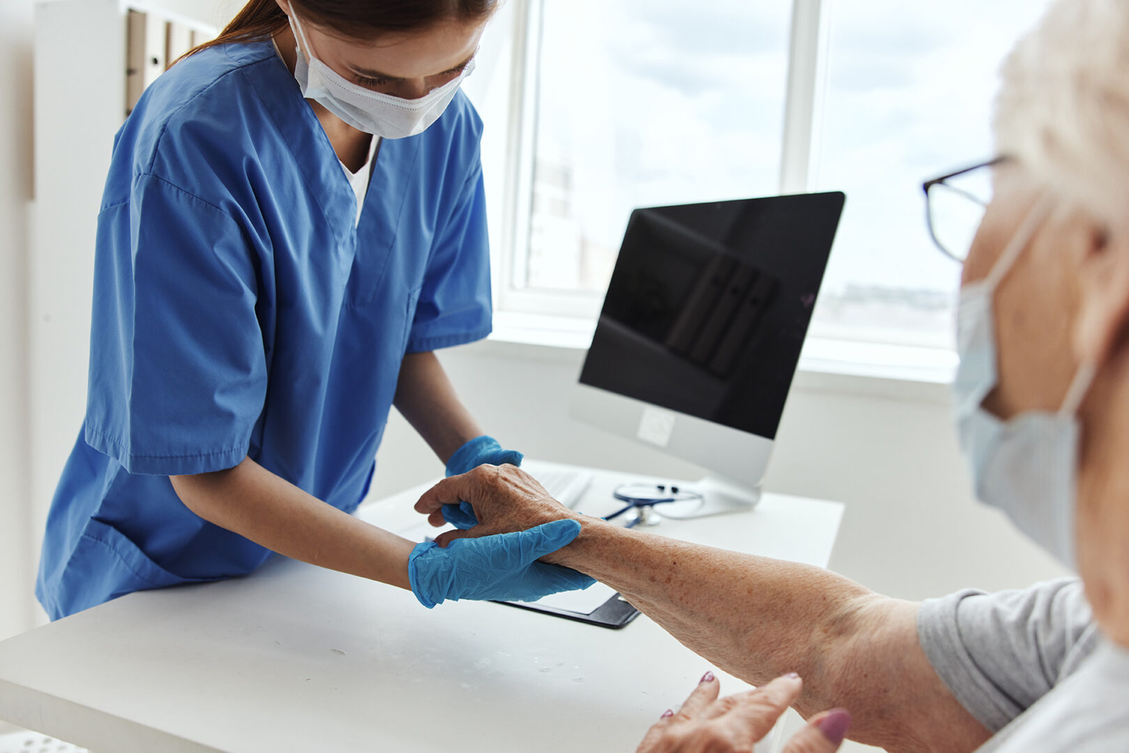 elderly woman and doctor Hospital visit health care. High quality photo